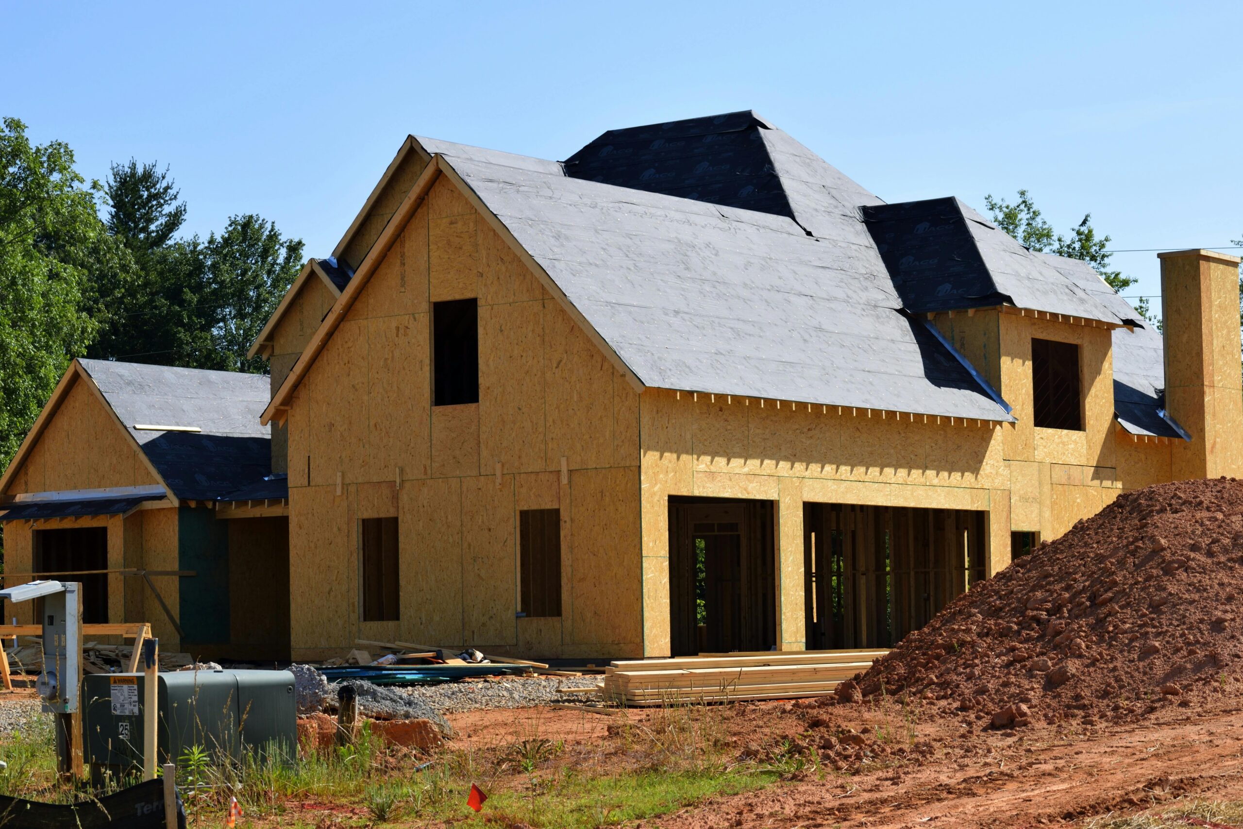 This image depicts an exterior view of a home being built.
