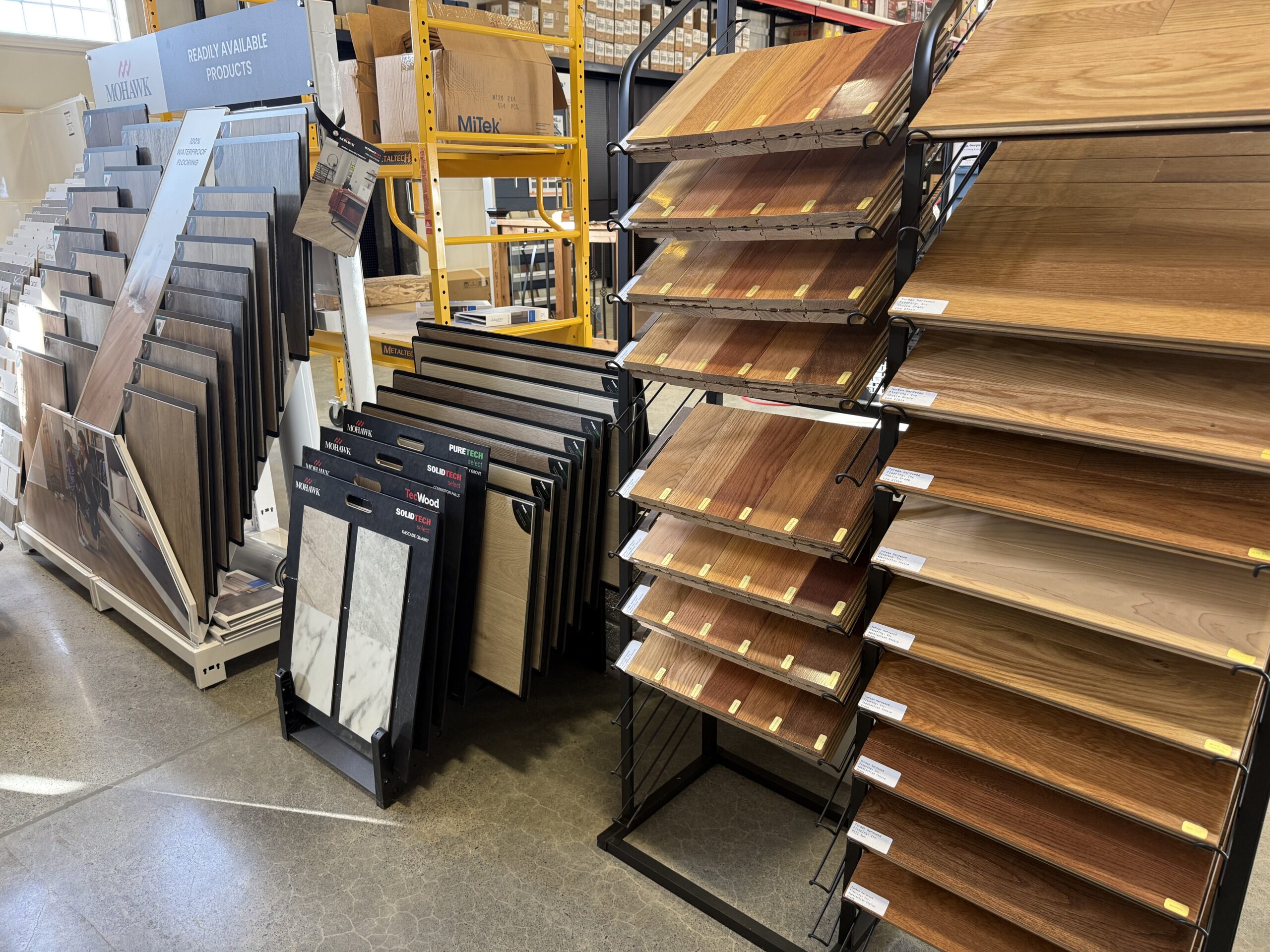 This image depicts a sheet of plywood being cut.
